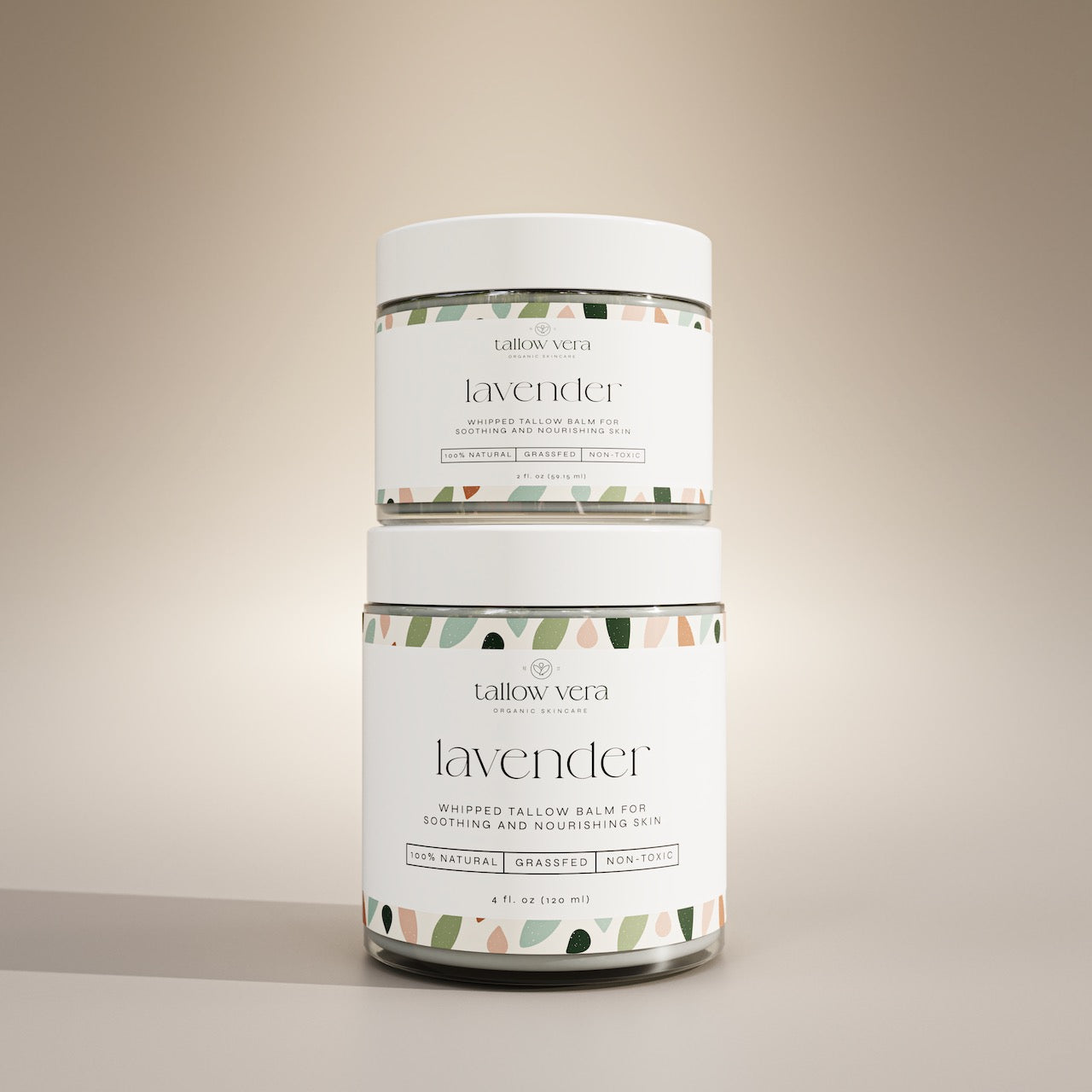 2 oz and 4oz lavender whipped tallow balms stacked on one another