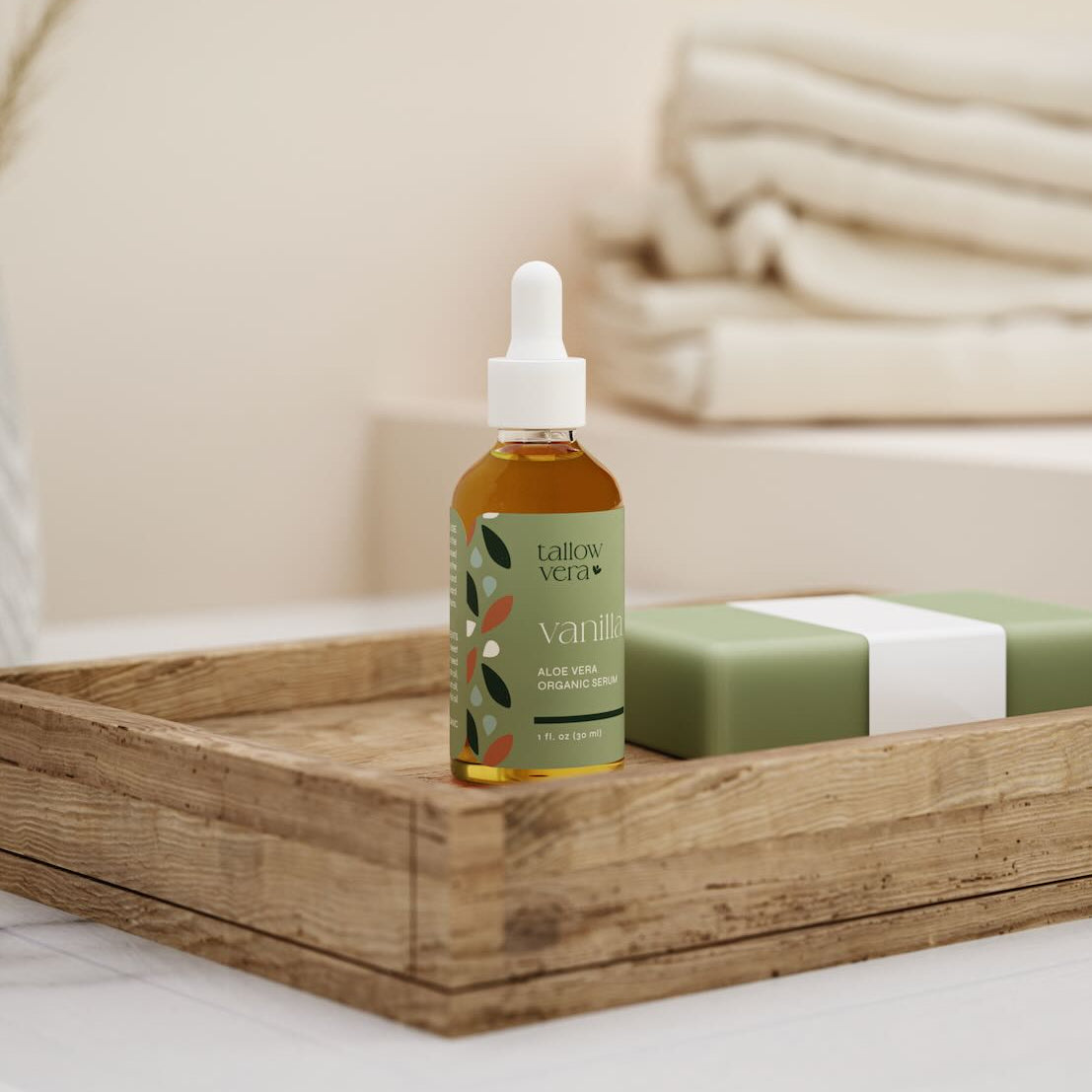 Tallow Vera's vanilla Aloe Vera organic serum sitting in box with soap within a bathroom setting
